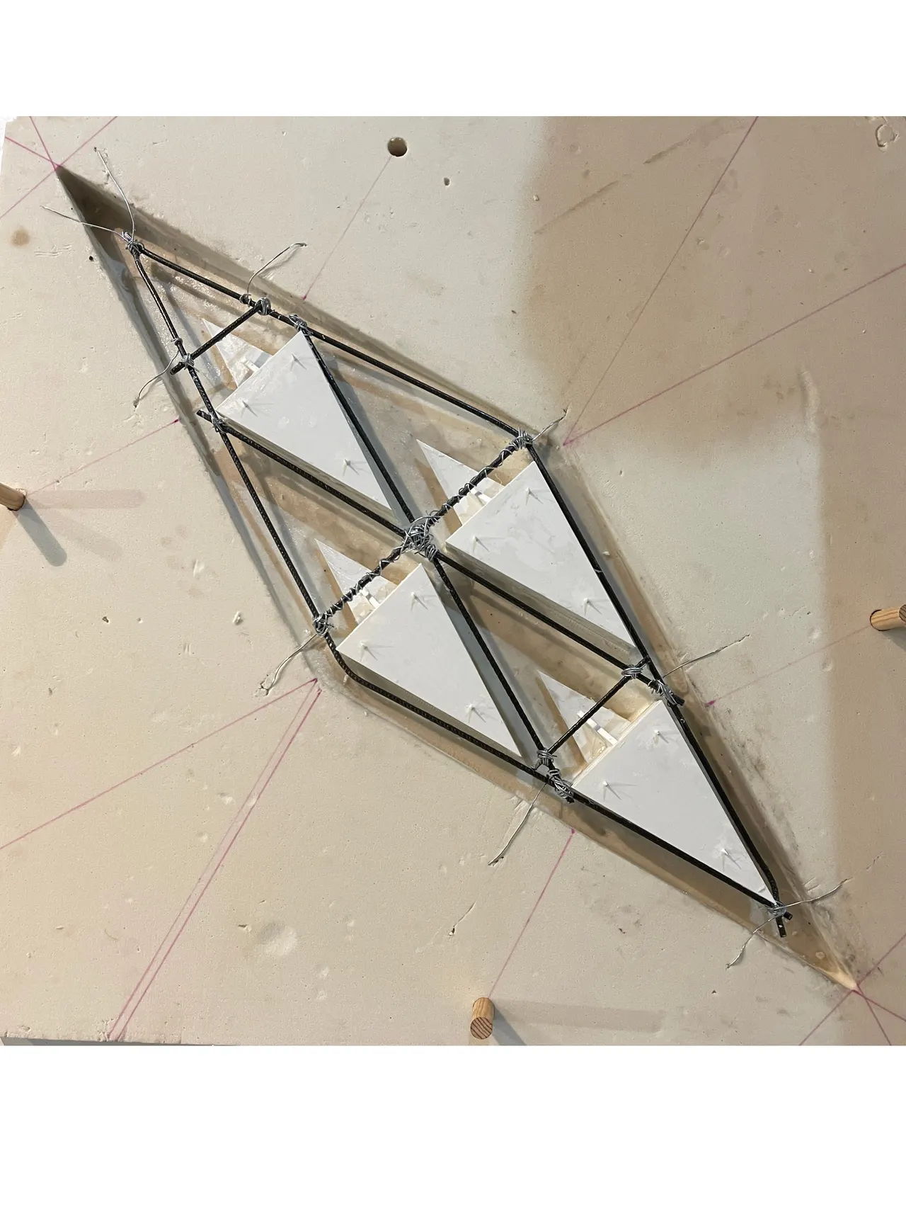 A cast prototype of a diamond-shaped opening