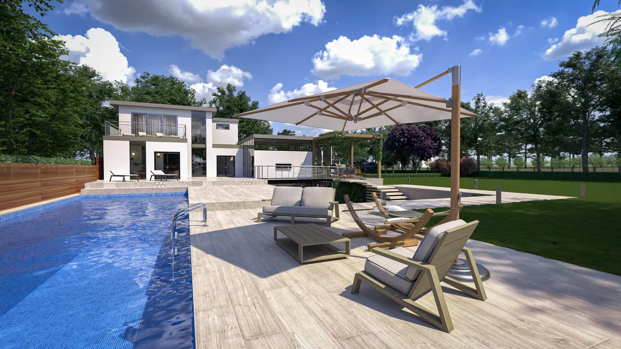 The pool terrace and villa under a summer sky